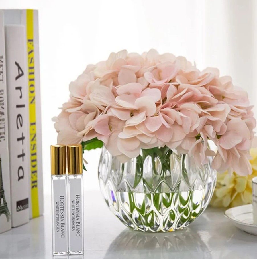 Perfumed bouquet of hydrangeas in transparent vase Blush