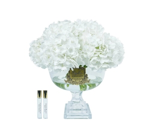 Parfumed bouquet of hydrageas in transparent vase Provence white
